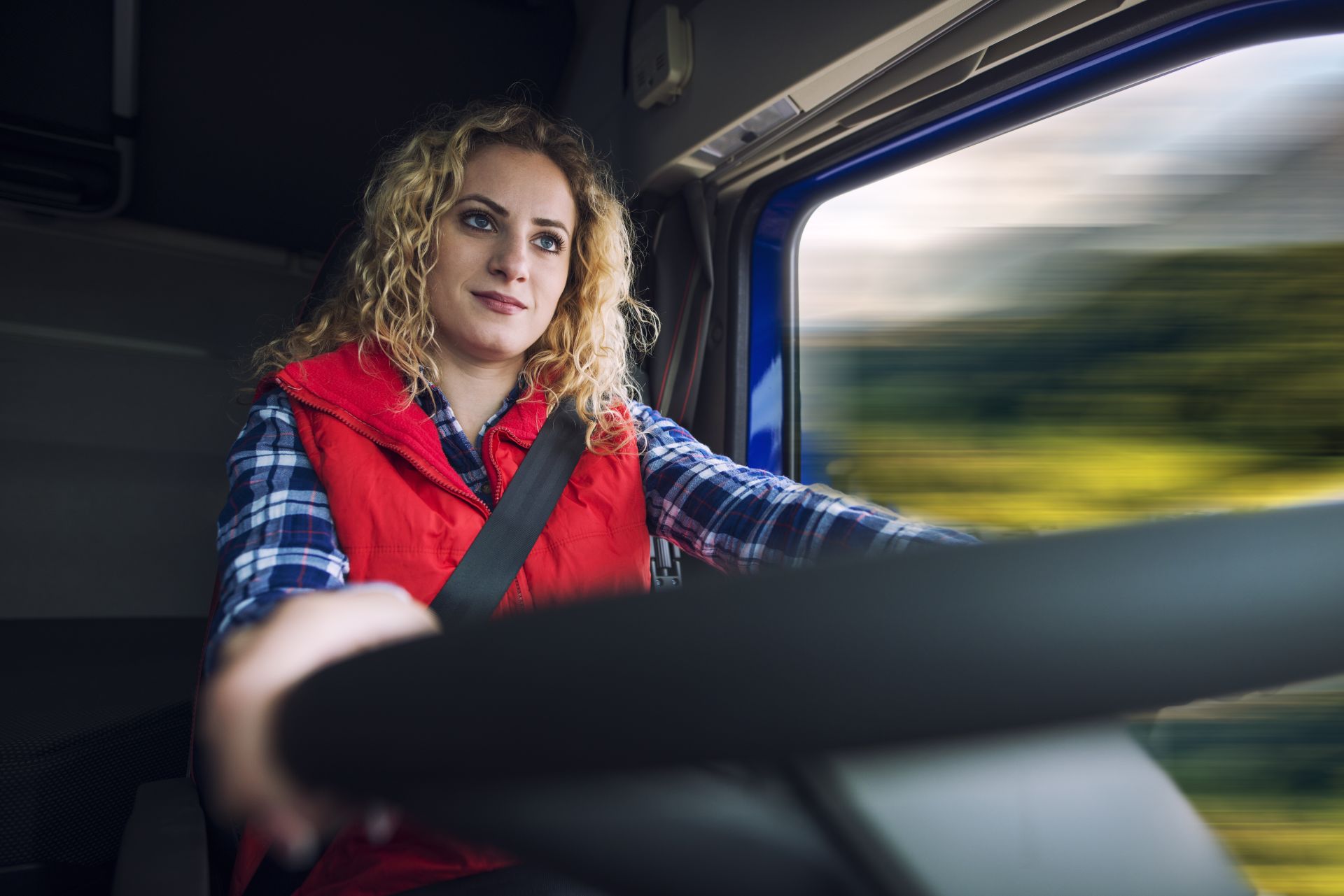 woman-driving-truck-vehicle